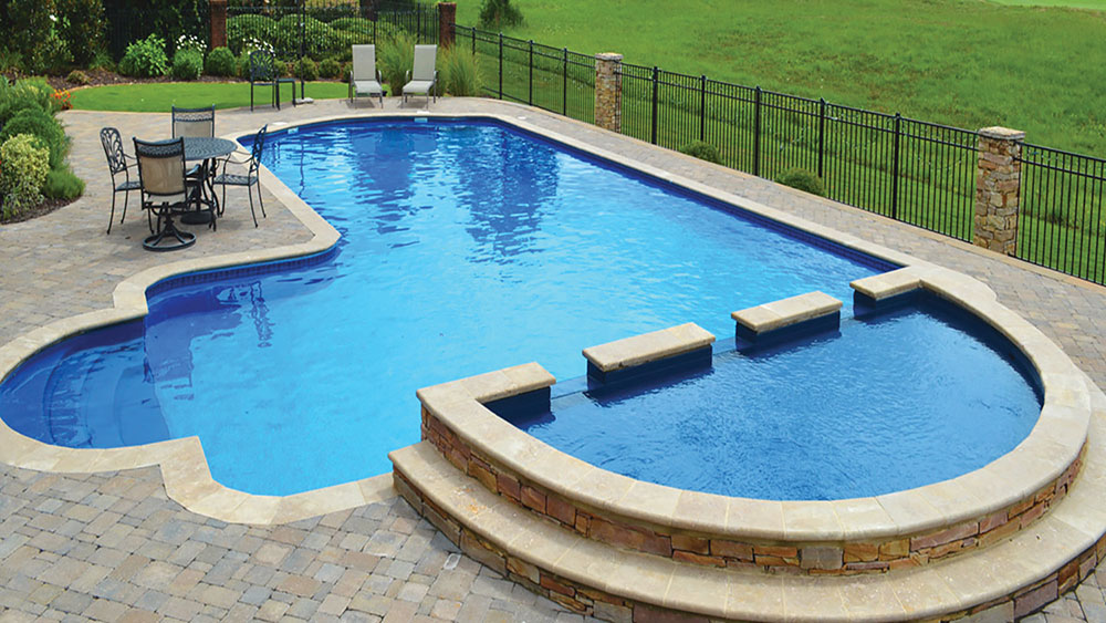 Photo 2. Photo shows a permanently installed pool constructed in the ground capable of holding water at a depth greater than 42 inches